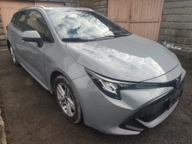 Toyota Corolla 1.8 Хибрид Комби Euro 6D - 14750 € / 28848.49 лв. - 61377934 3