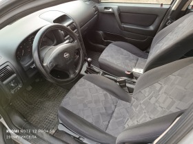 Opel Astra 1.6 mono Газ клима, снимка 9 - Автомобили и джипове - 45088975