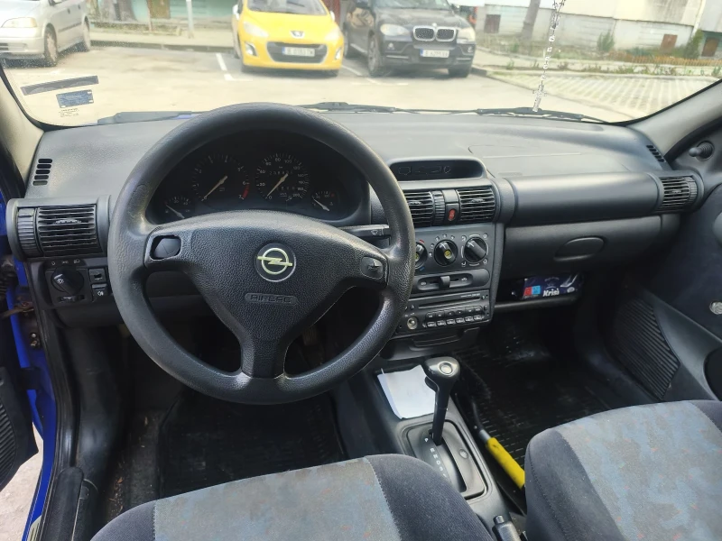 Opel Corsa 1, 2 65hp, снимка 7 - Автомобили и джипове - 53465709