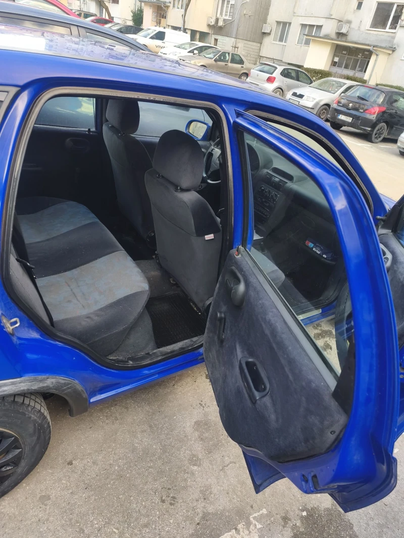 Opel Corsa 1, 2 65hp, снимка 9 - Автомобили и джипове - 53465709