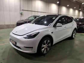 ������ Tesla Model Y