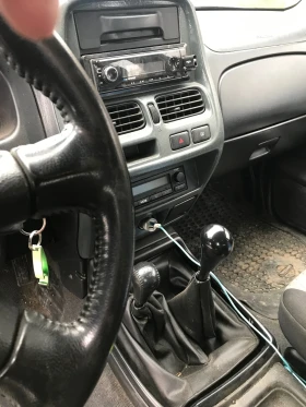 Nissan Navara 2.7 125коня механично ГНП - 7400 € / 14473.14 лв. - 28568961 12
