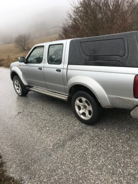 Nissan Navara 2.7 125коня механично ГНП - 7400 € / 14473.14 лв. - 28568961 5