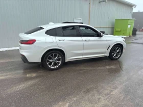 BMW X4 M40i  CARFAX - 23500 € / 45962.00 лв. - 52410963 3