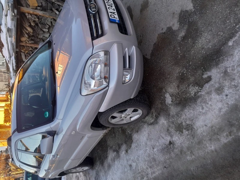 Kia Sportage, снимка 2 - Автомобили и джипове - 46882636