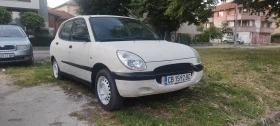 Daihatsu Sirion 1.0 4x4, снимка 1