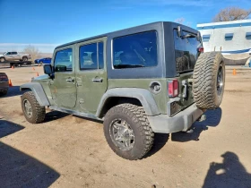 Jeep Wrangler UNLIMITED RUBICON - 14627 € / 28607.93 лв. - 54376189 4