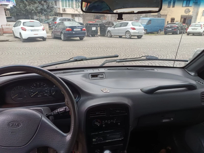 Kia Sportage 2.0, снимка 9 - Автомобили и джипове - 53226186
