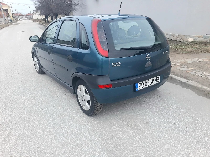 Opel Corsa 1.2i.75k + КЛИМА .ВЕРИГА. ТОП. , снимка 8 - Автомобили и джипове - 48226725