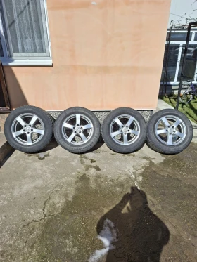 Гуми с джанти Continental 220/60R16, снимка 1