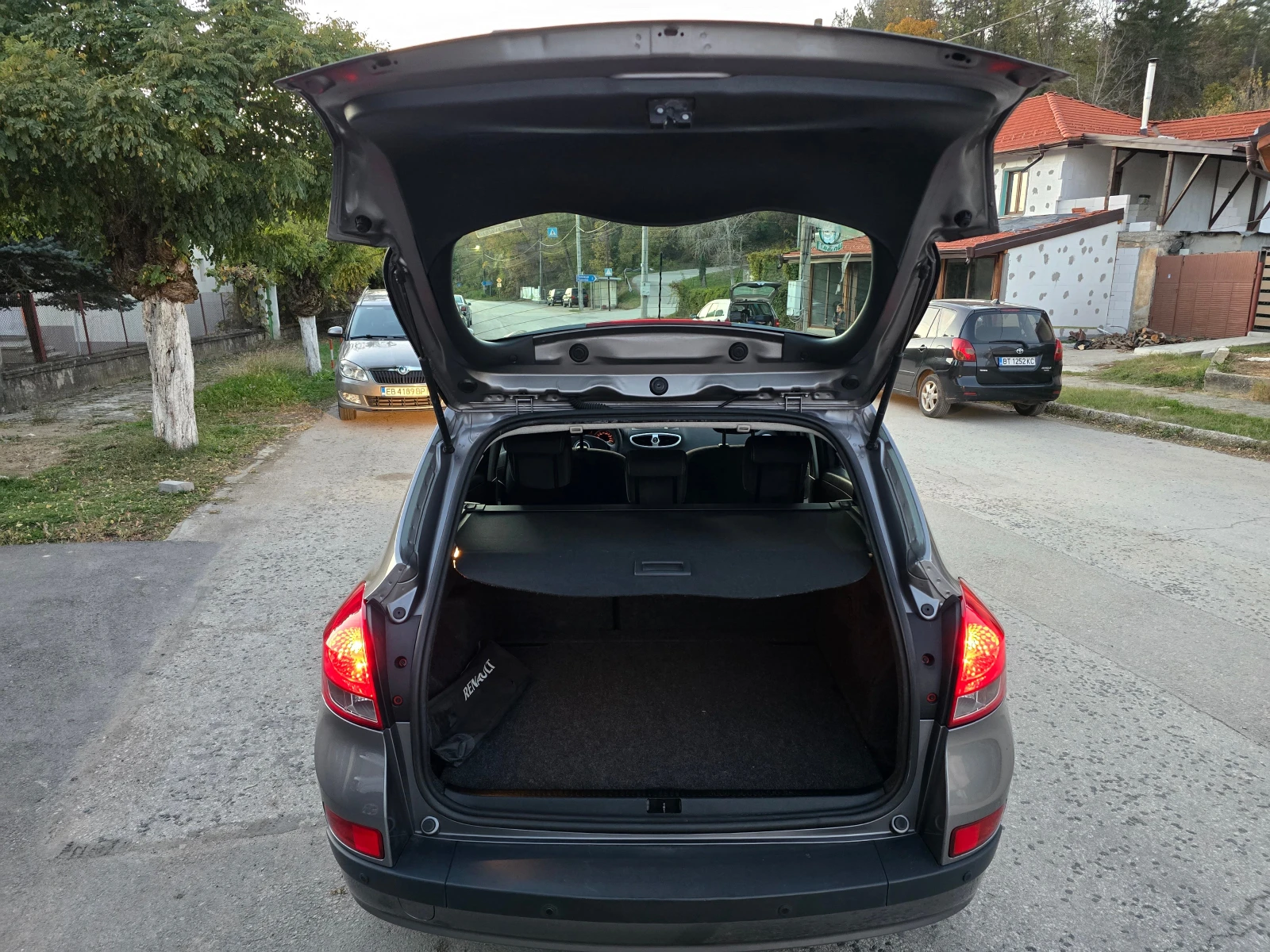 Renault Clio 1.5DCi/NAVI-75ps, снимка 11 - Автомобили и джипове - 56650770