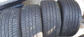      235/40R18