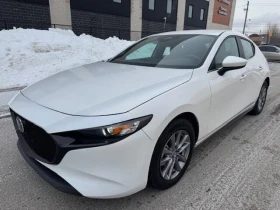 ������ Mazda 3