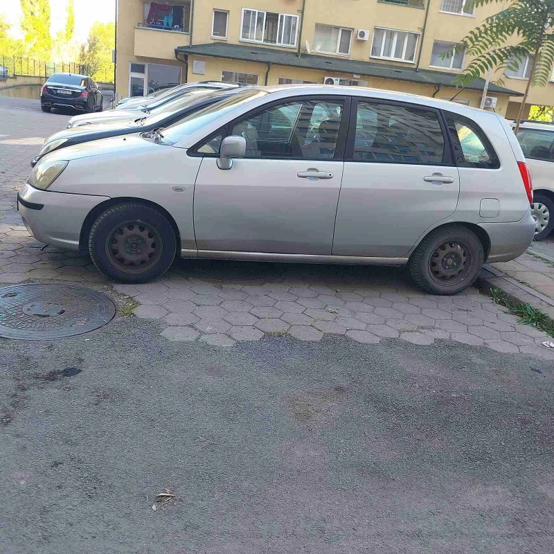 Suzuki Liana, снимка 6 - Автомобили и джипове - 47799664