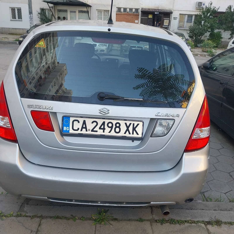 Suzuki Liana, снимка 5 - Автомобили и джипове - 47799664