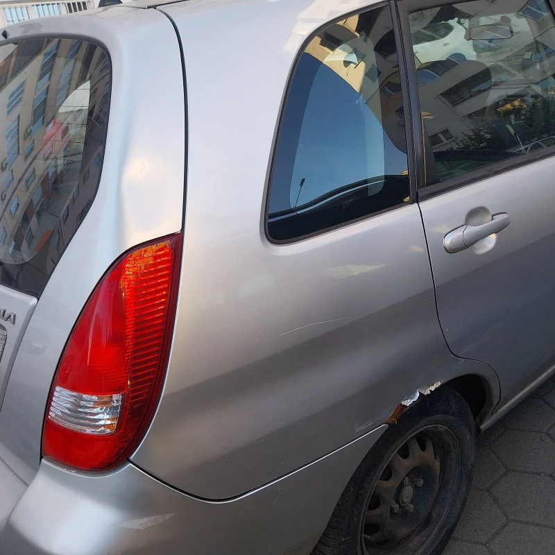 Suzuki Liana, снимка 3 - Автомобили и джипове - 47799664