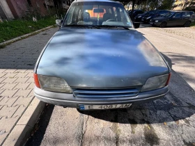 Opel Kadett 1.6 i, снимка 1