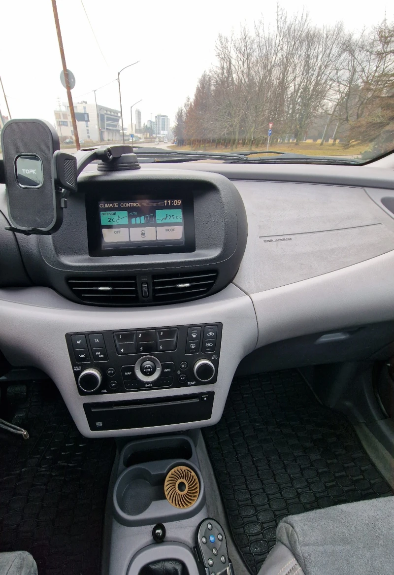 Nissan Almera tino V10, снимка 12 - Автомобили и джипове - 53235414