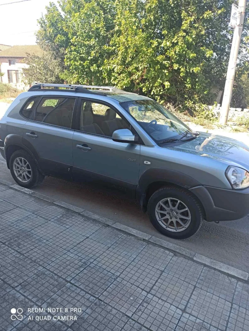 Hyundai Tucson Crdi, снимка 4 - Автомобили и джипове - 47077178