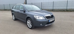 Skoda Octavia  Скаут 2.0  140 4x4   - изображение 6