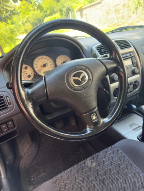 Mazda 323 323F, снимка 4