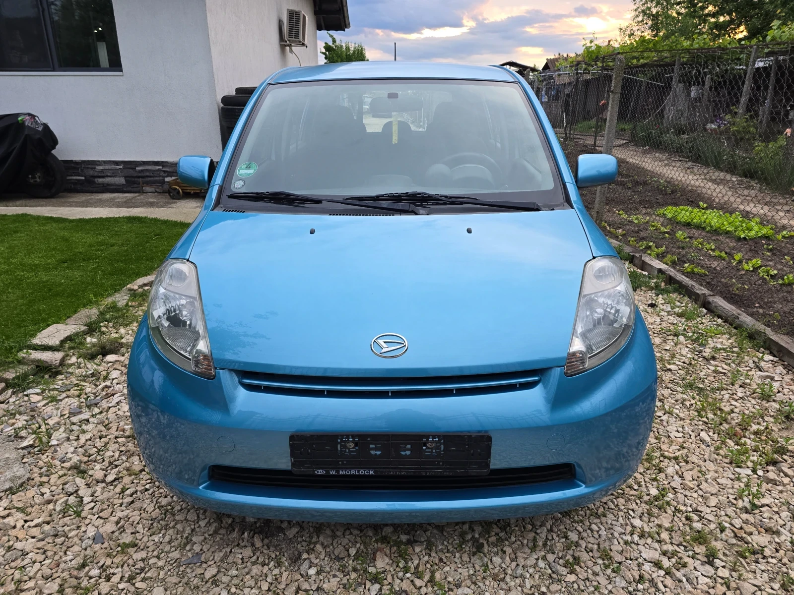 Daihatsu Sirion, снимка 13 - Автомобили и джипове - 54671683