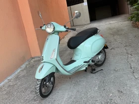     Vespa Primavera  120 .