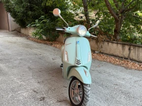     Vespa Primavera  120 .