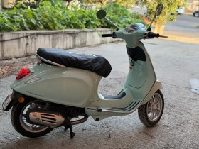     Vespa Primavera  120 .