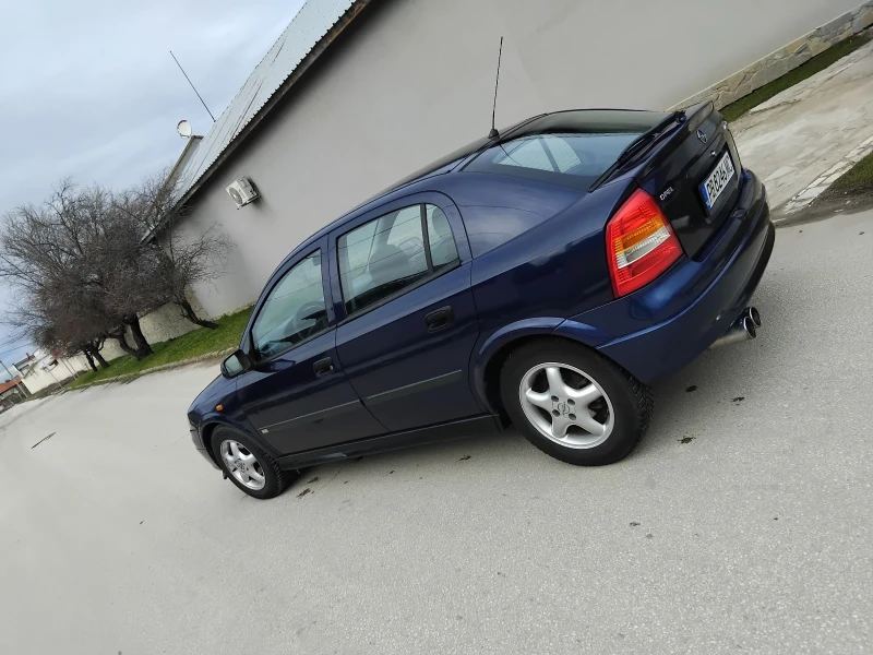 Opel Astra 1.6.75к.МОНО + КЛИМА + ГАЗ , снимка 8 - Автомобили и джипове - 53196079