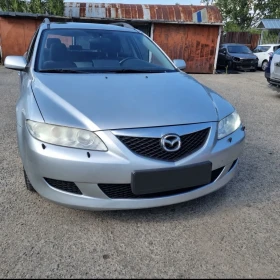 ������ Mazda 6