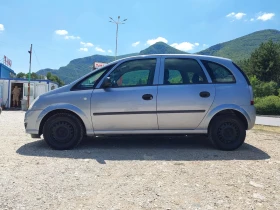 Opel Meriva 1.3- 70кс. Климатик, снимка 4