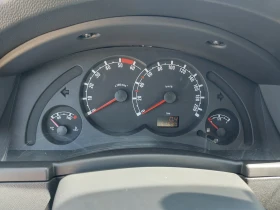 Opel Meriva 1.3- 70кс. Климатик, снимка 14
