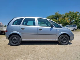 Opel Meriva 1.3- 70кс. Климатик, снимка 7
