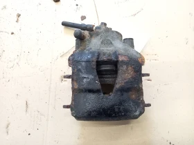 Спирачен апарат преден десен Фолксваген Голф 4 1.4Б (к)