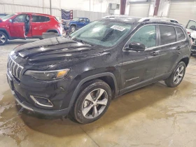 ������ Jeep Cherokee