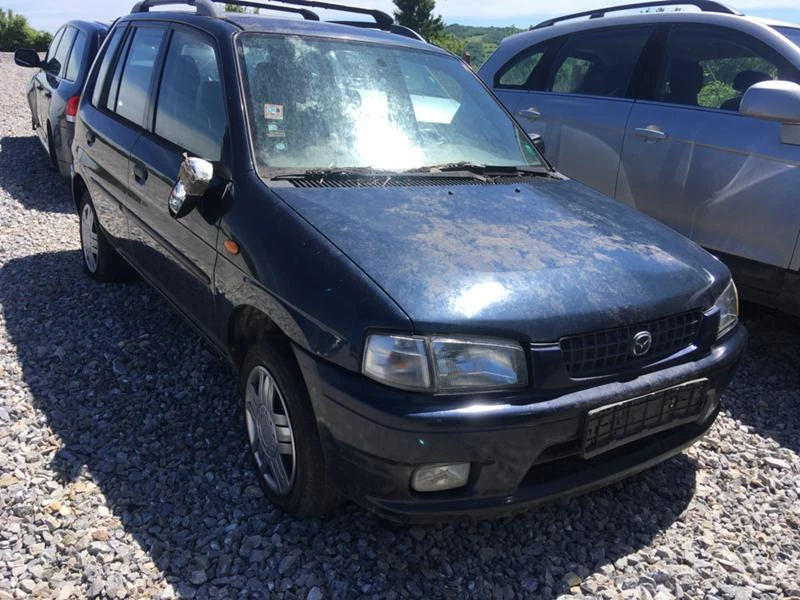 Mazda Demio 1.3, снимка 1 - Автомобили и джипове - 33011492