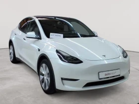 ������ Tesla Model Y