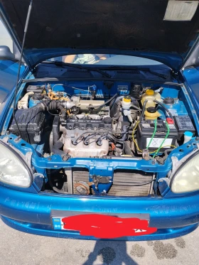 Daewoo Lanos Бензин, газ, снимка 11