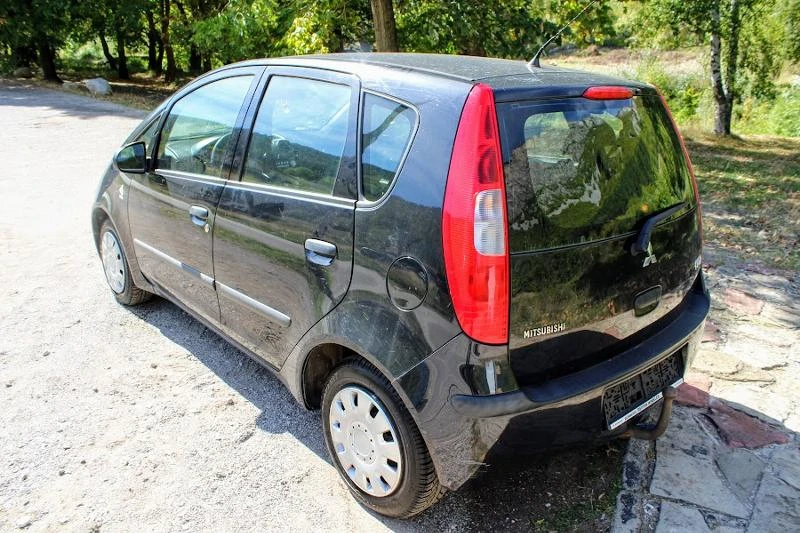 Mitsubishi Colt 1.1КЛИМАТИК, снимка 7 - Автомобили и джипове - 47403412