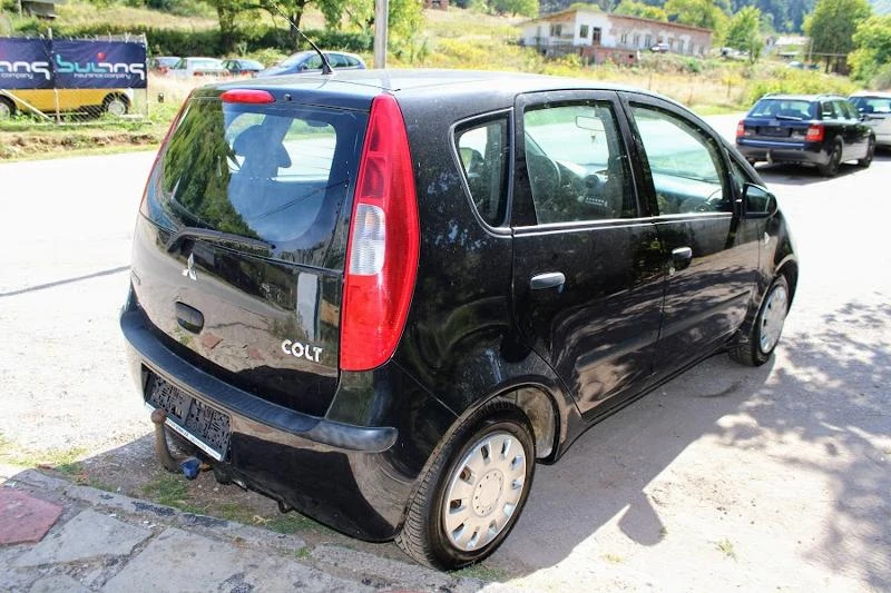 Mitsubishi Colt 1.1КЛИМАТИК, снимка 5 - Автомобили и джипове - 47403412