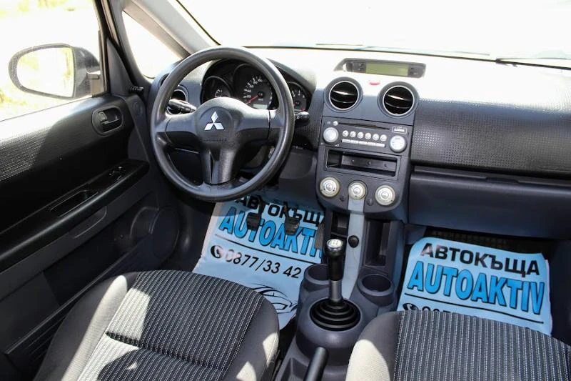 Mitsubishi Colt 1.1КЛИМАТИК, снимка 12 - Автомобили и джипове - 47403412