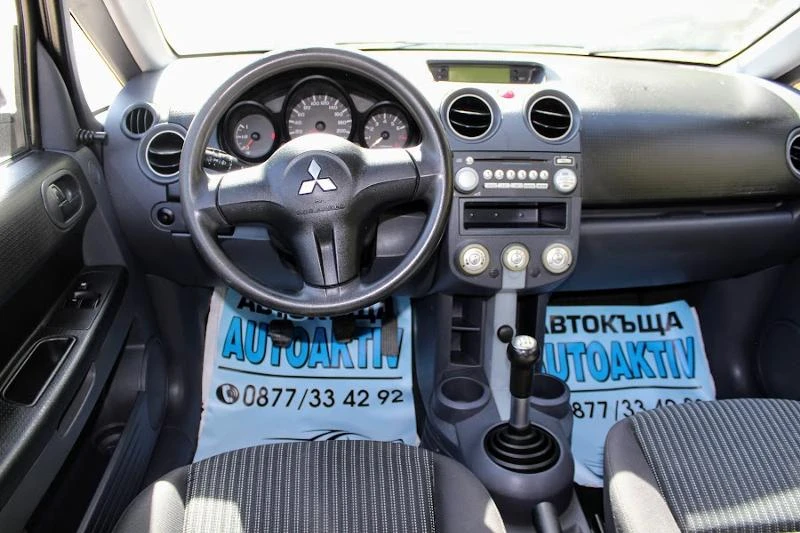 Mitsubishi Colt 1.1КЛИМАТИК, снимка 13 - Автомобили и джипове - 47403412