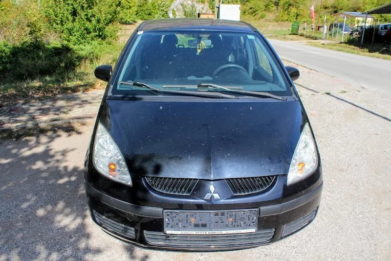 Mitsubishi Colt 1.1КЛИМАТИК, снимка 3 - Автомобили и джипове - 47403412