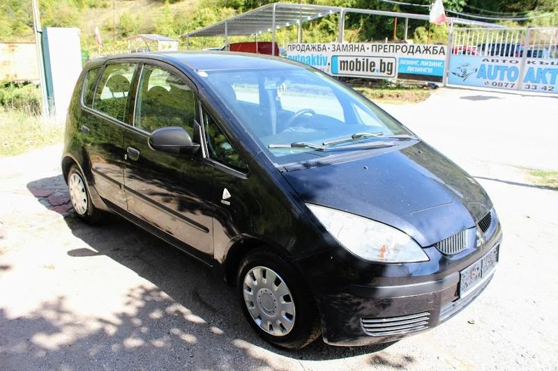 Mitsubishi Colt 1.1КЛИМАТИК, снимка 4 - Автомобили и джипове - 47403412