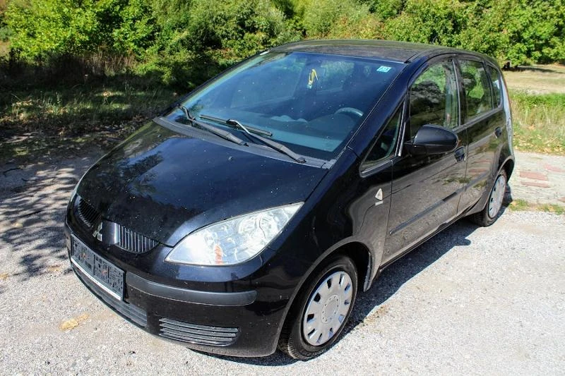 Mitsubishi Colt 1.1КЛИМАТИК, снимка 2 - Автомобили и джипове - 47403412