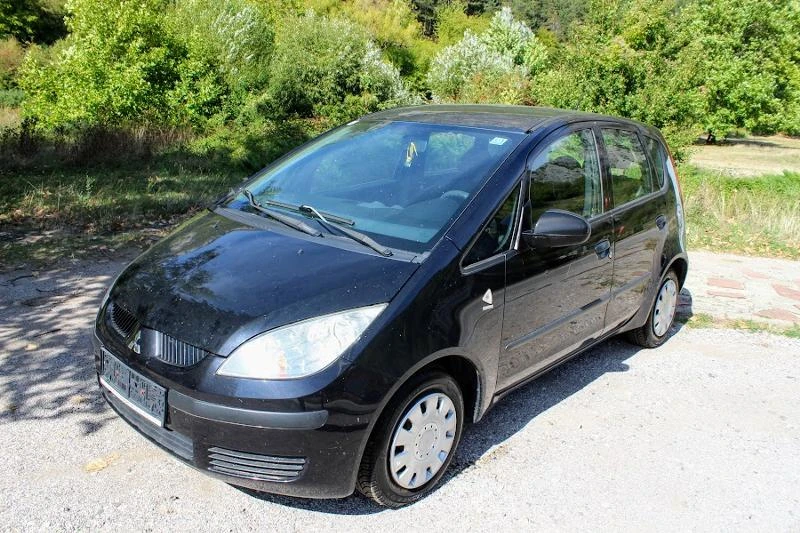 Mitsubishi Colt 1.1КЛИМАТИК, снимка 16 - Автомобили и джипове - 47403412