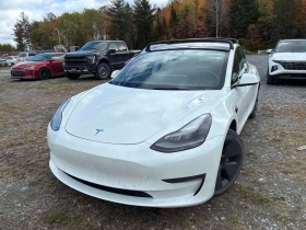 ������ Tesla Model 3