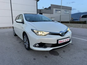 Toyota Auris HYBRID - AUTO/ LINE ASS/ HEAT/ PANORAMA, снимка 1