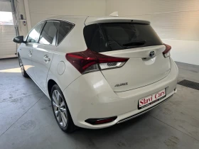 Toyota Auris HYBRID - AUTO/ LINE ASS/ HEAT/ PANORAMA - 24400 лв. - 77471692 6